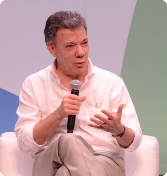 Santos: Juan Manual Santos speaks at a multilingual event in Cartagena, Colombia, where there is simultaneous interpretation into English